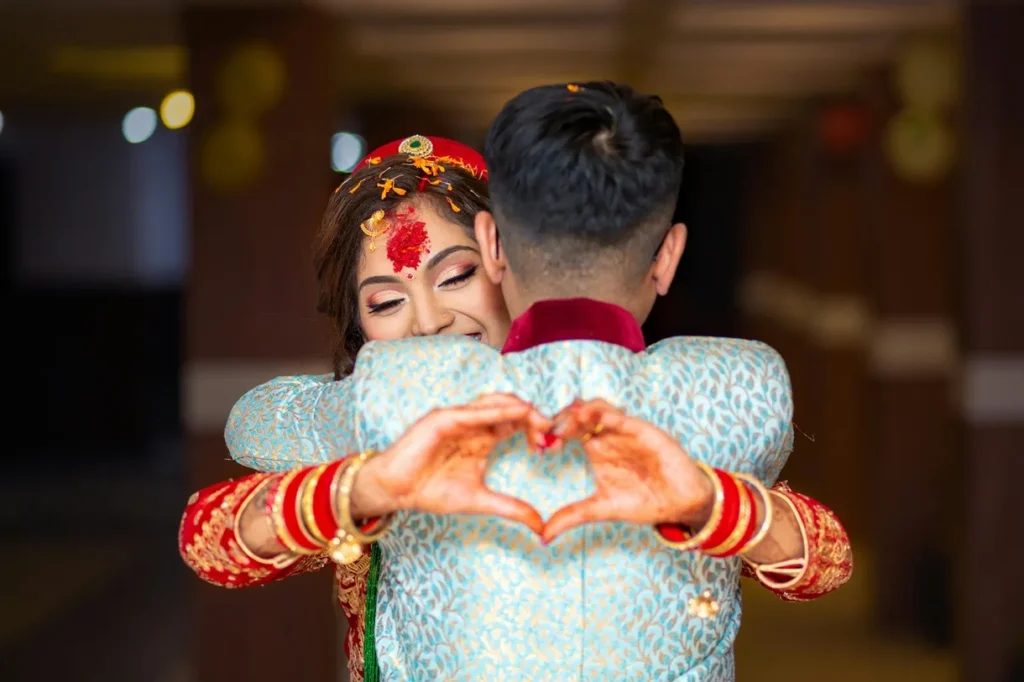 Couple laughing naturally during candid wedding photography style in Nepal